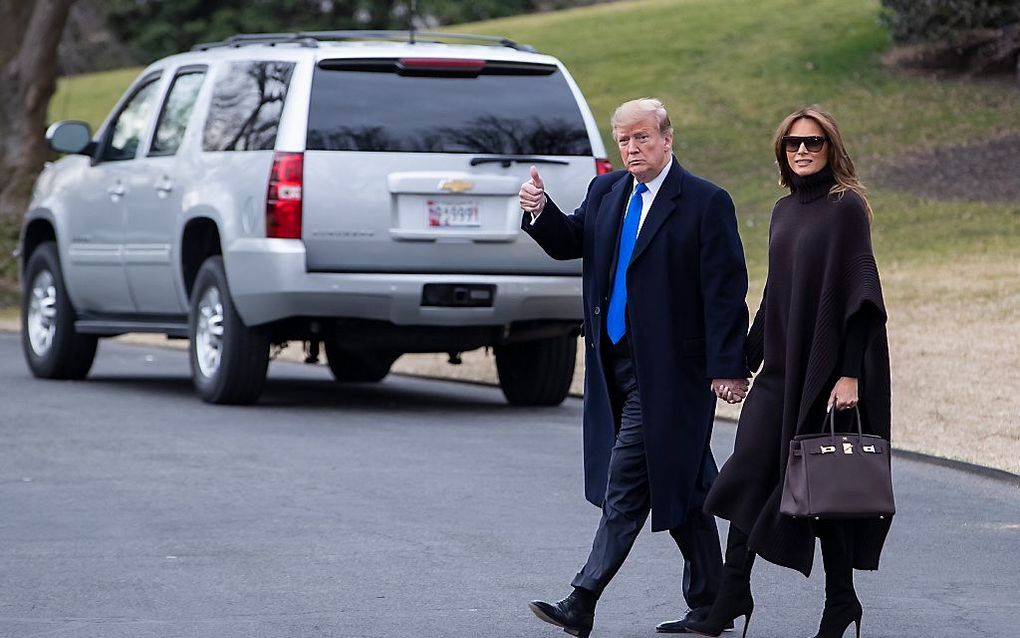 De Amerikaanse president Donald Trump en zijn vrouw Melania. beeld EPA