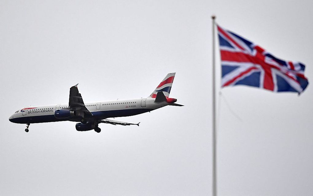 De gebedsbijeenkomst van Duitse en Britse christenen had plaats op luchthaven Londen Heathrow. beeld AFP, Ben Stansall