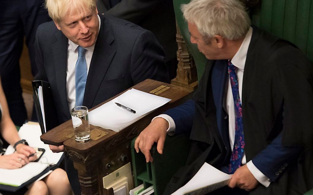 Parlementsvoorzitter John Bercow en premier Boris Johnson. beeld AFP