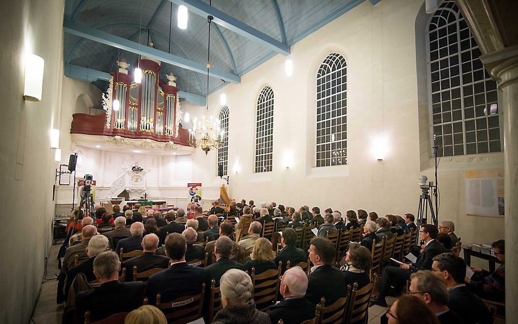 Een bijeenkomst in de Trinitatiskapel in Dordrecht. beeld Cees van der Wal