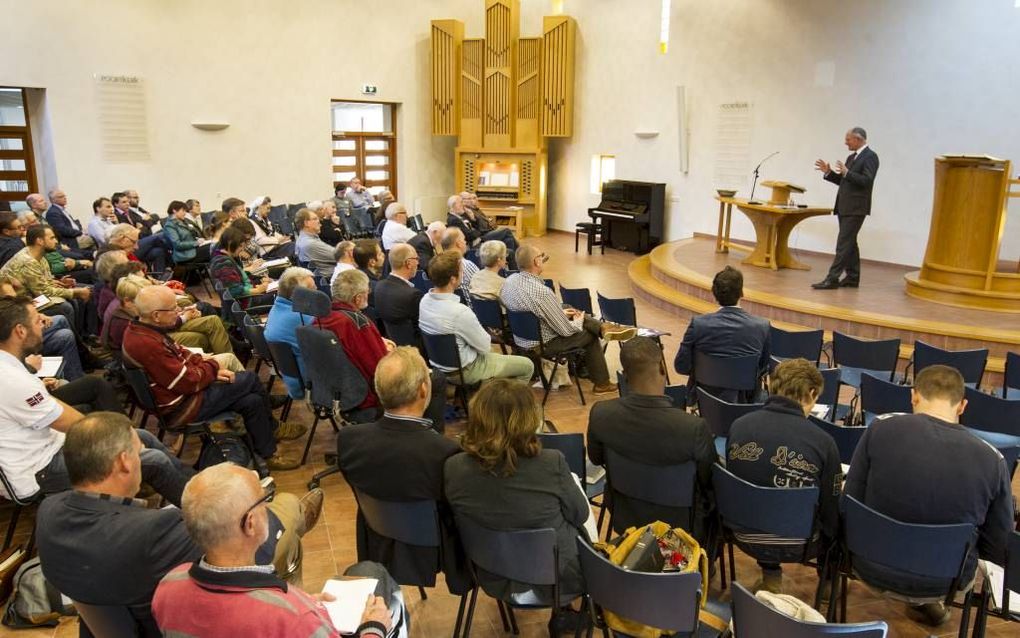 In de Poortkerk in Veenendaal begon vrijdag een tweedaags symposium van de Sola 5 Baptisten over het geloof. beeld RD, Anton Dommerholt