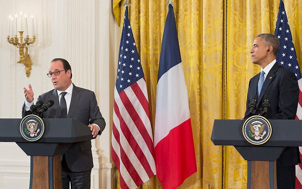 Hollande (l.) en Obama. beeld EPA