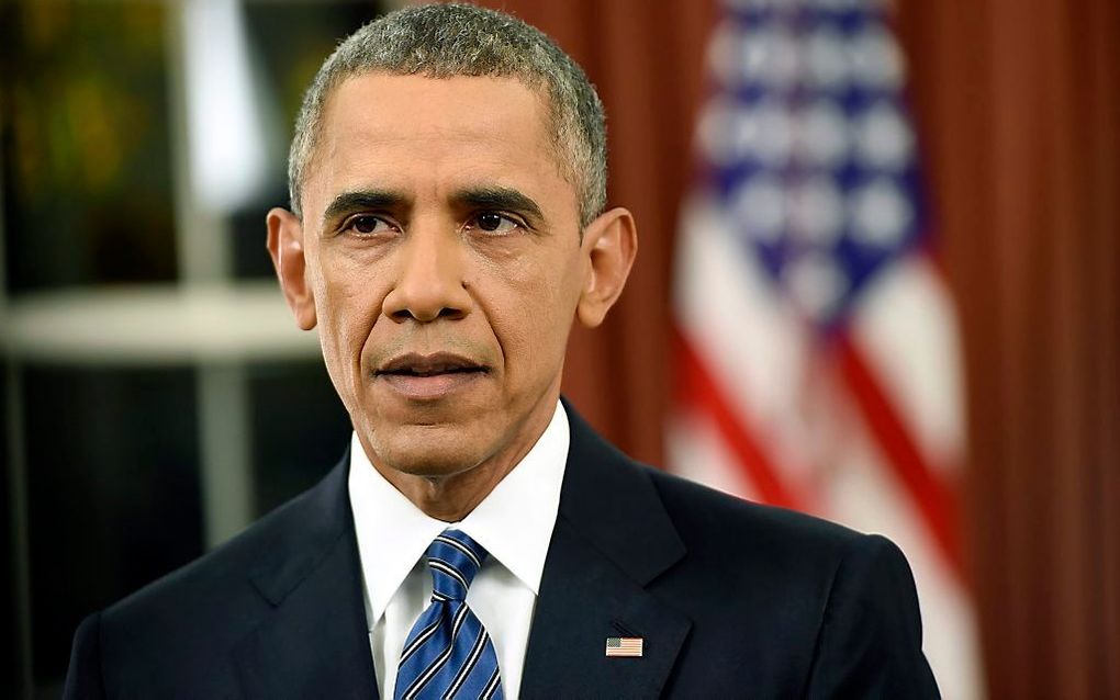 President Obama zondag tijdens zijn toespraak vanuit het Oval Office. Beeld EPA