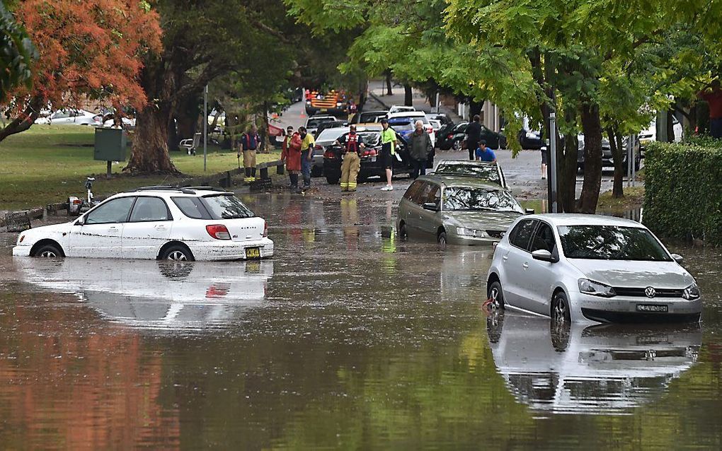 Het Australische Sydney is woensdag verrast door een zeldzame tornado.  beeld AFP