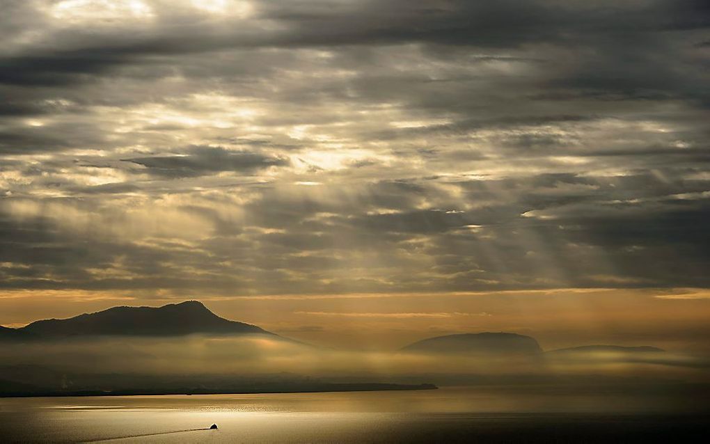 Ook in het Zwitserse Genève loopt de temperatuur donderdag op tot in de dubbele cijfers. beeld EPA