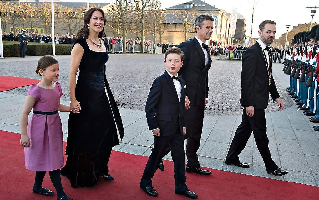 De Deense prins Christian met zijn ouders, kroonprins Frederik en kroonprinses Mary. beeld EPA