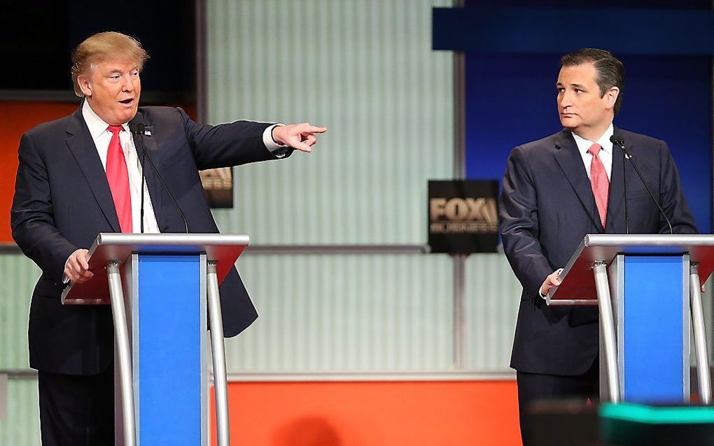 CHARLESTON. Vooral Donald Trump (l) en Ted Cruz vlogen elkaar gisteravond tijdens een Republikeins tv-debat in de haren. beeld AFP