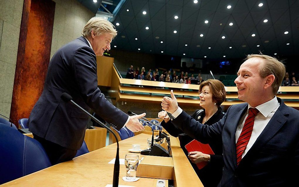 Staatssecretaris Van Rijn (L) en SGP-leider Van der Staaij. beeld ANP