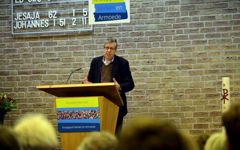 Prof dr. Herman Noordegraaf sprak vrijdag in de Opstandingskerk in Houten op het congres Kerken en Armoede. beeld Ton Borsboom