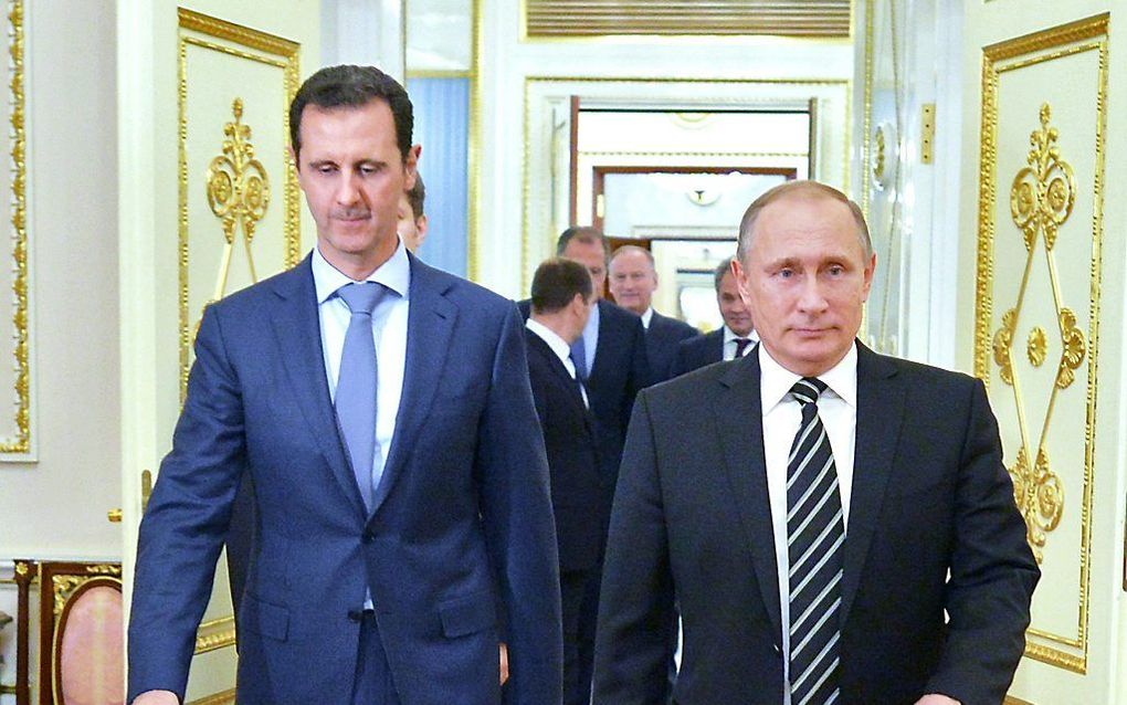 Assad (l.) en Poetin. beeld EPA