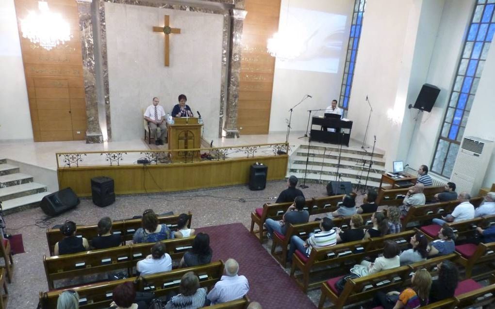 Assyrische christenen in een kerk in Syrië. beeld Open Doors