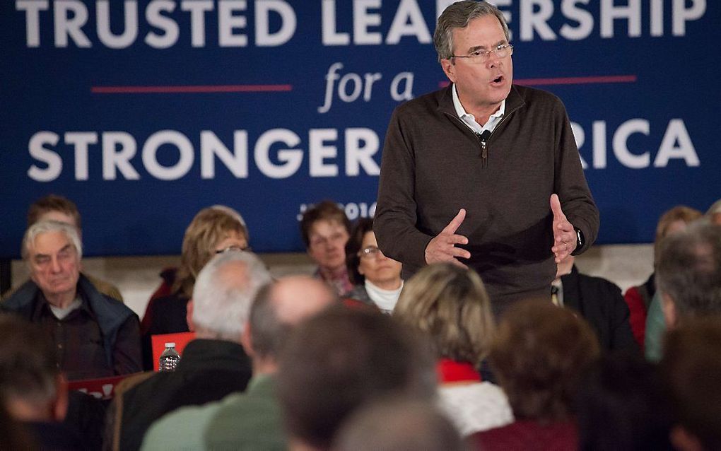 Bush in New Hampshire: „Klap alsjeblieft!” beeld AFP