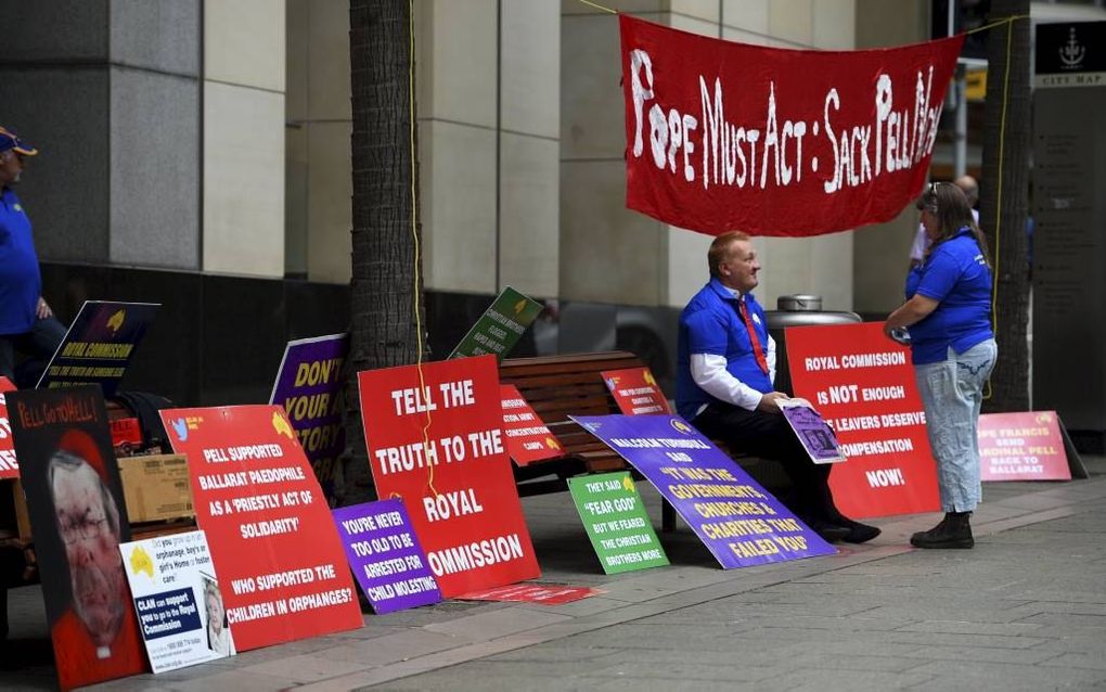 Demonstranten bij de commissie in Sydney. beeld EPA