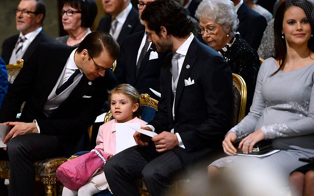 De dankdienst voor de geboorte van de Zweedse prins Oscar in de koninklijke kapel in het paleis in Stockholm. beeld EPA