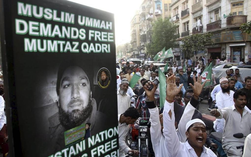 Protest in Pakistan tegen de executie van Mumtaz Qadri. beeld EPA