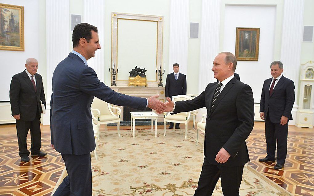 Voor Rusland is het belangrijk dat de Syrische president Assad in het zadel blijft. beeld EPA, Alexei Druzhinin