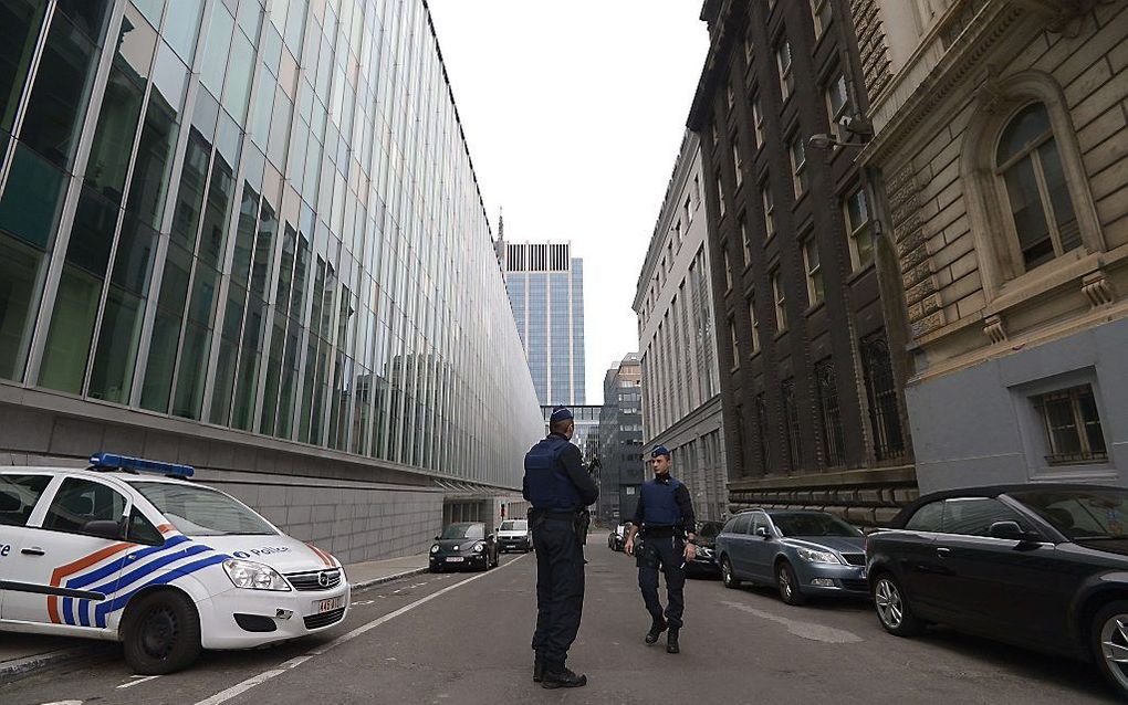 Politie in Brussel bij het kantoor van de federale gerechtelijke politie. Beeld AFP