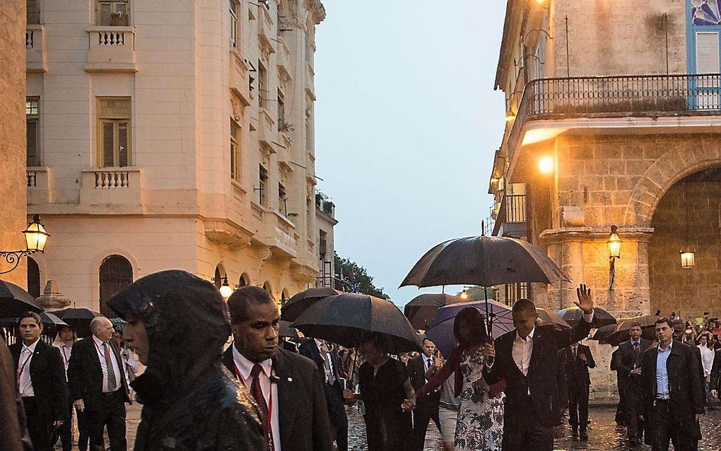 Obama in een regenachtig Havana. Beeld AFP