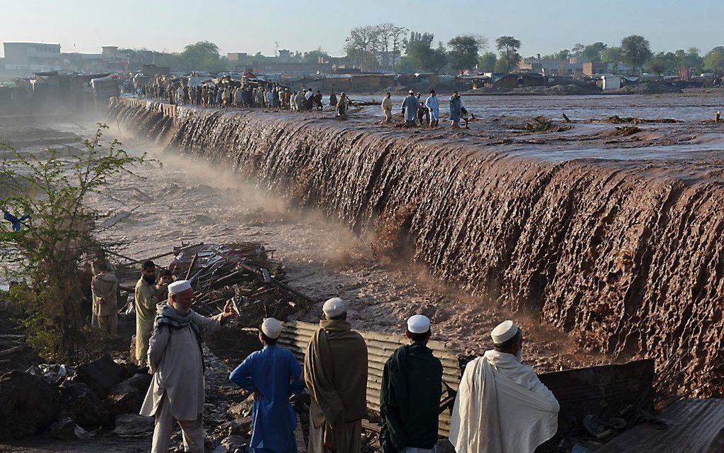 Overstromingen maandag in Pakistan. Beeld AFP