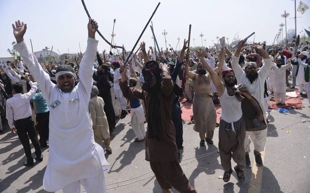 Demonstranten bij het Pakistaanse parlement. beeld AFP, Aamir Qureshi