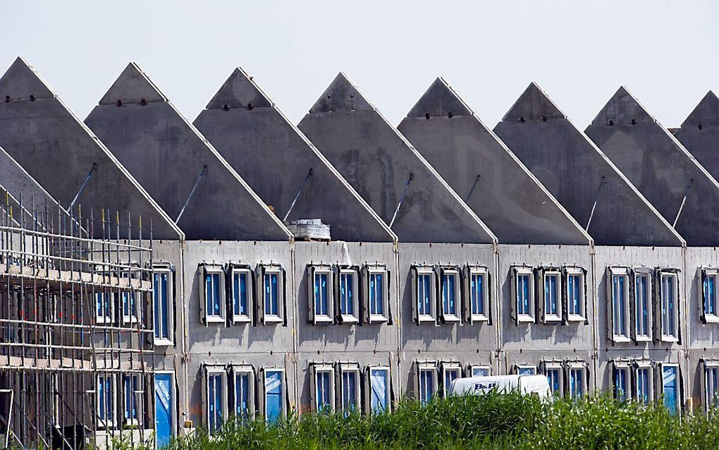 Rijtjeshuizen in aanbouw in Almere. beeld ANP