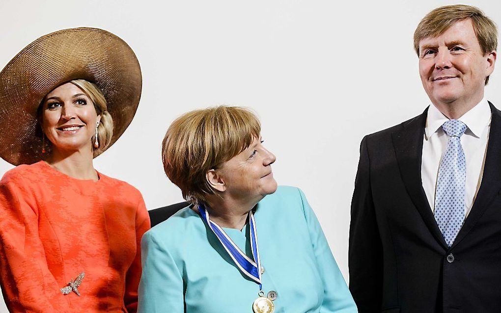 Koningin Máxima, bondskanselier Merkel en koning Willem-Alexander, beeld ANP, Remko de Waal.