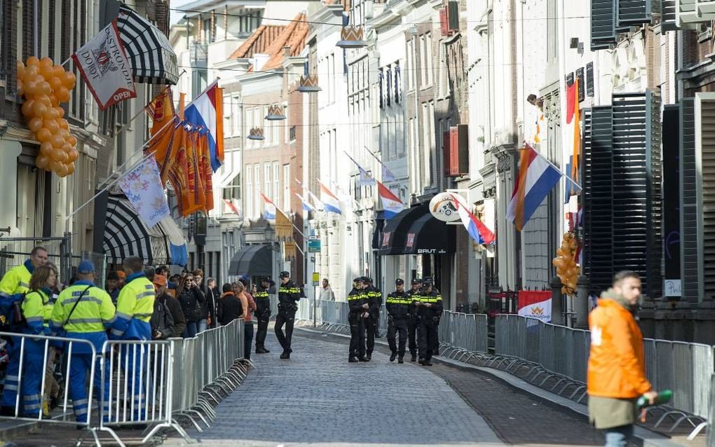 De foto politie in Dordrecht tijdens Koningsdag vorig jaar.  beeld ANP, Bart Maat