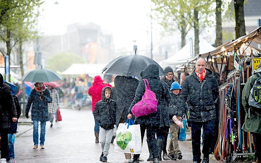 Regen op Koningsdag. Beeld ANP