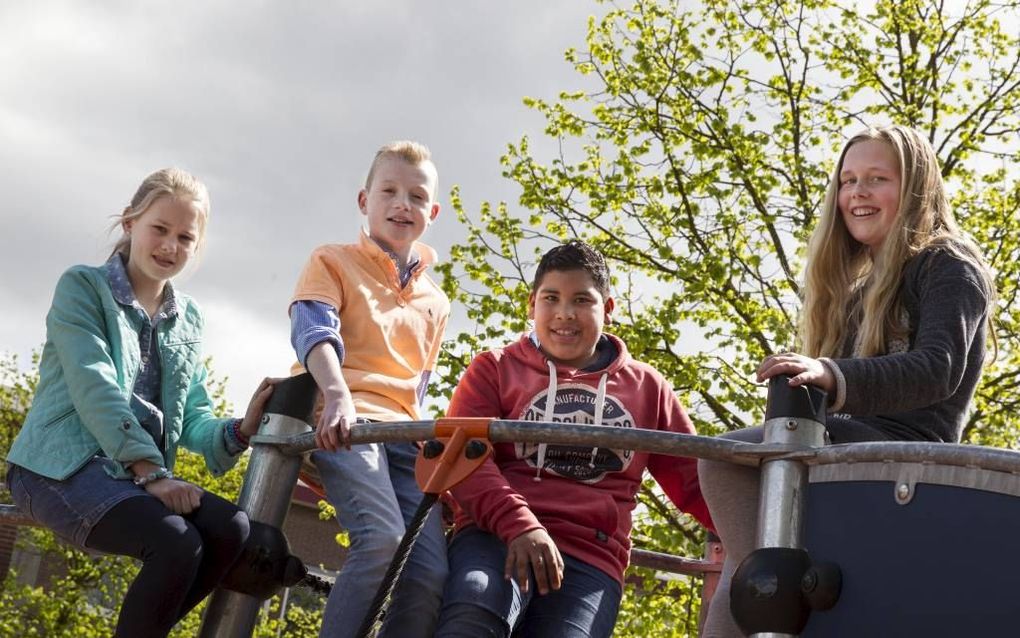 Leerlingen van de Calvijnschool te Veenendaal. Van links naar rechts: Nellianne, Benjamin, Brayan en Trude. beeld RD, Anton Dommerholt