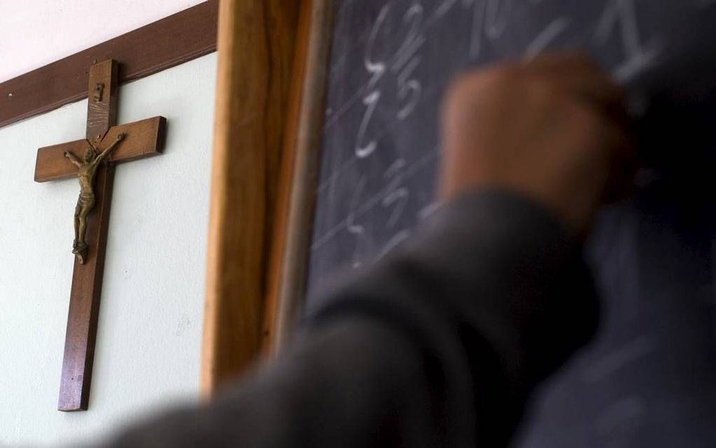 In Vlaanderen klinkt in het maatschappelijk debat na de aanslagen in Brussel geregeld het pleidooi voor een neutraal vak rond ethiek en burgerzin op de scholen. Het huidige godsdienstonderwijs moet daarvoor op de schop. beeld Reuters, Tony Gentile