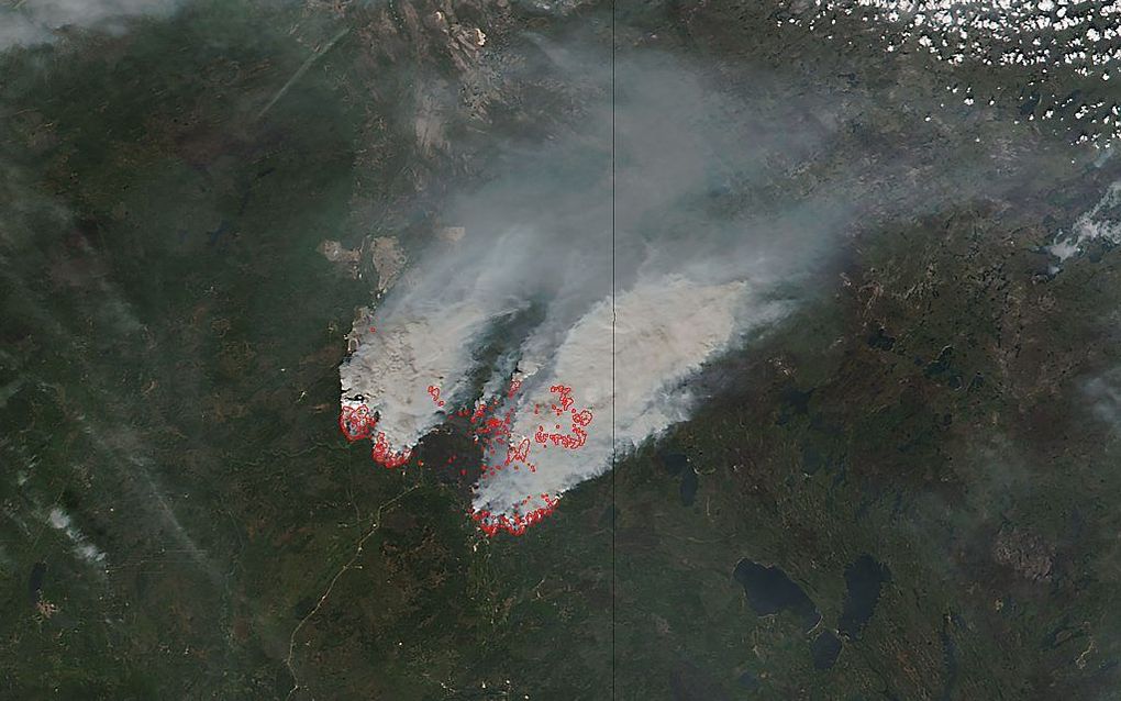 De bosbranden rond de Canadese plaats Fort McMurray zijn sinds maandag weer opgelaaid. beeld AFP