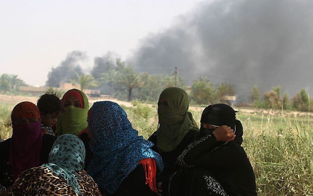 Inwoners van Fallujah op de vlucht. Beeld AFP