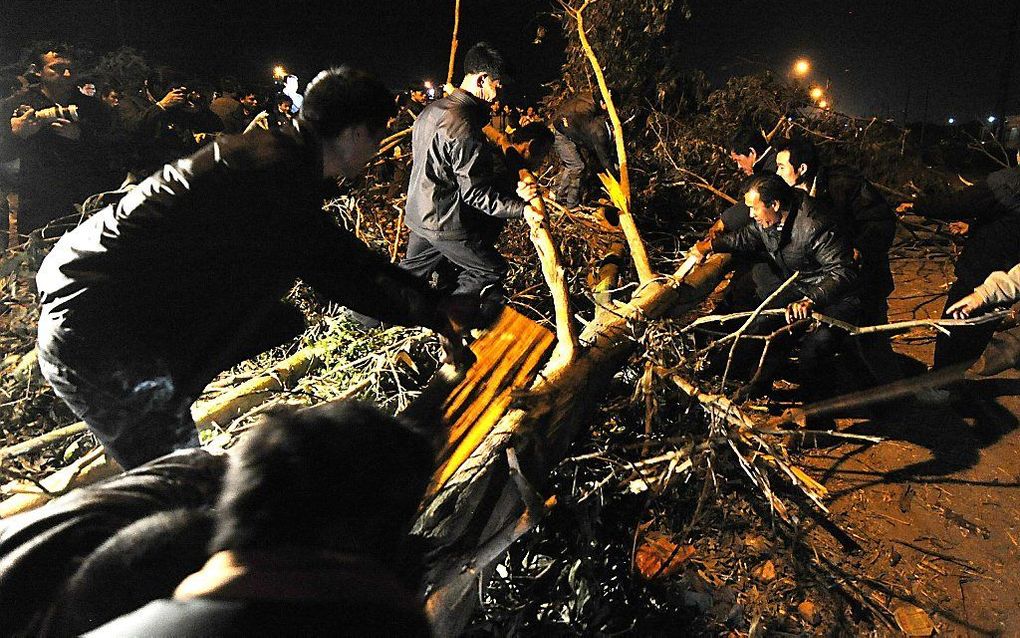 Barricade in het opstandige Chinese dorpje Wukan, december 2011. beeld AFP