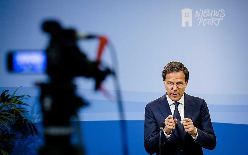 Premier Rutte tijdens zijn wekelijkse persconferentie na afloop van de wekelijkse ministerraad. beeld ANP, Bart Maat