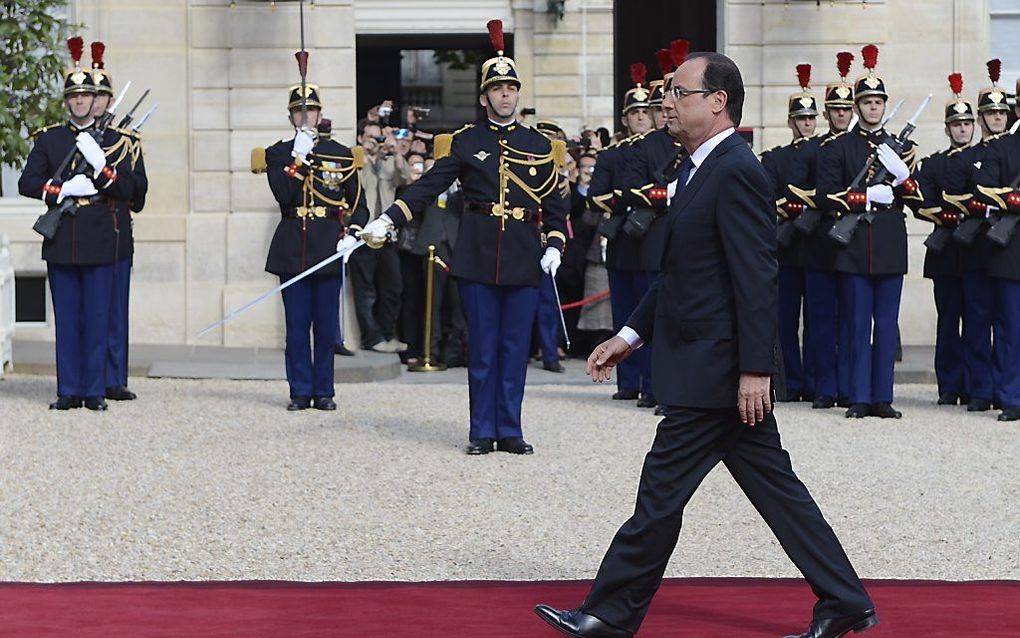 Hollande op de rode loper. Foto EPA