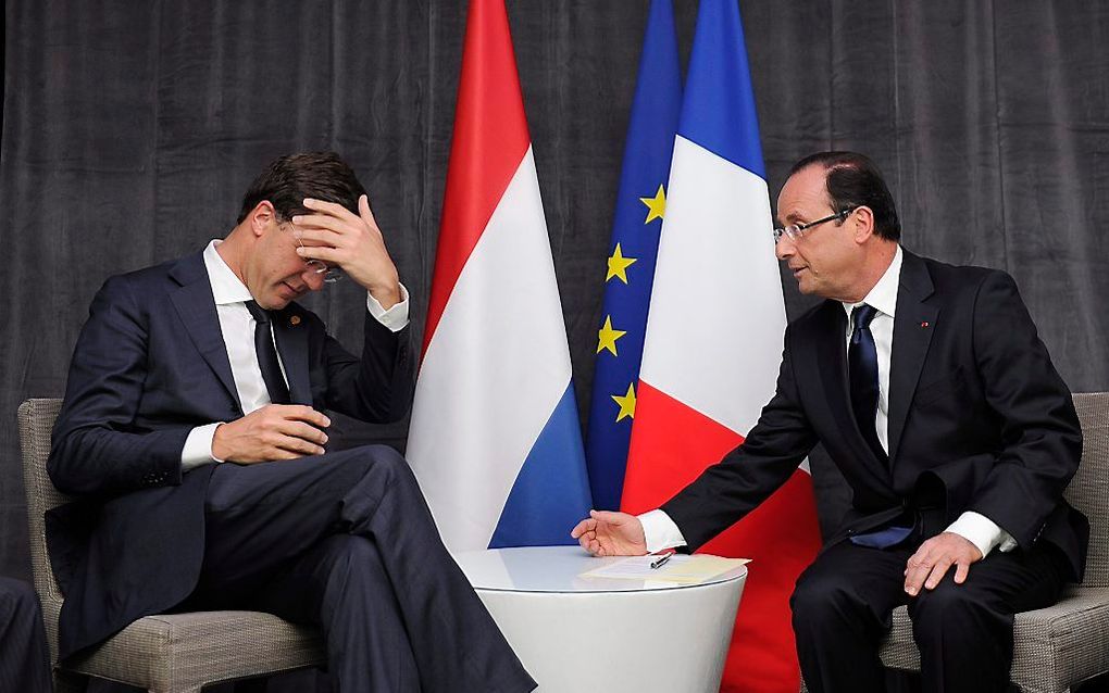 Rutte (l.) en Hollande. Foto EPA