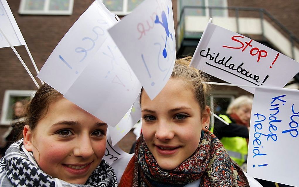 Kinderen demonstreren tegen kinderarbeid. Foto ANP