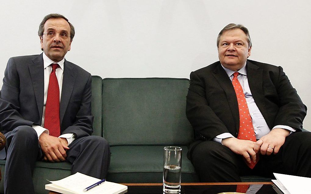 Samaras (L) van Nieuwe Democratie en Venizelos (R) van de socialistische partij Pasok. Foto EPA