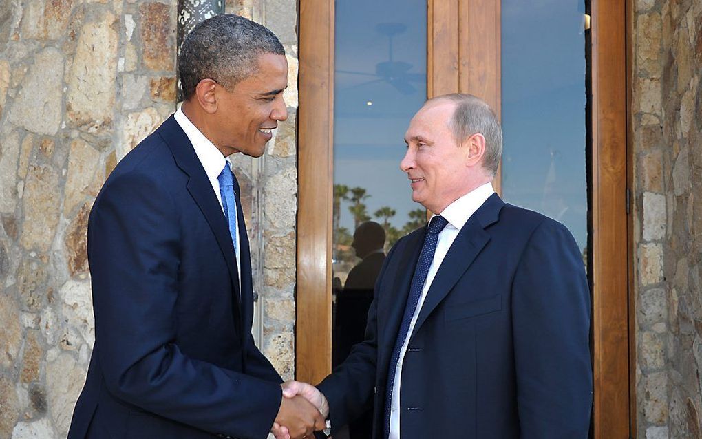 Barack Obama en Vladimir Poetin in Mexico. Foto EPA