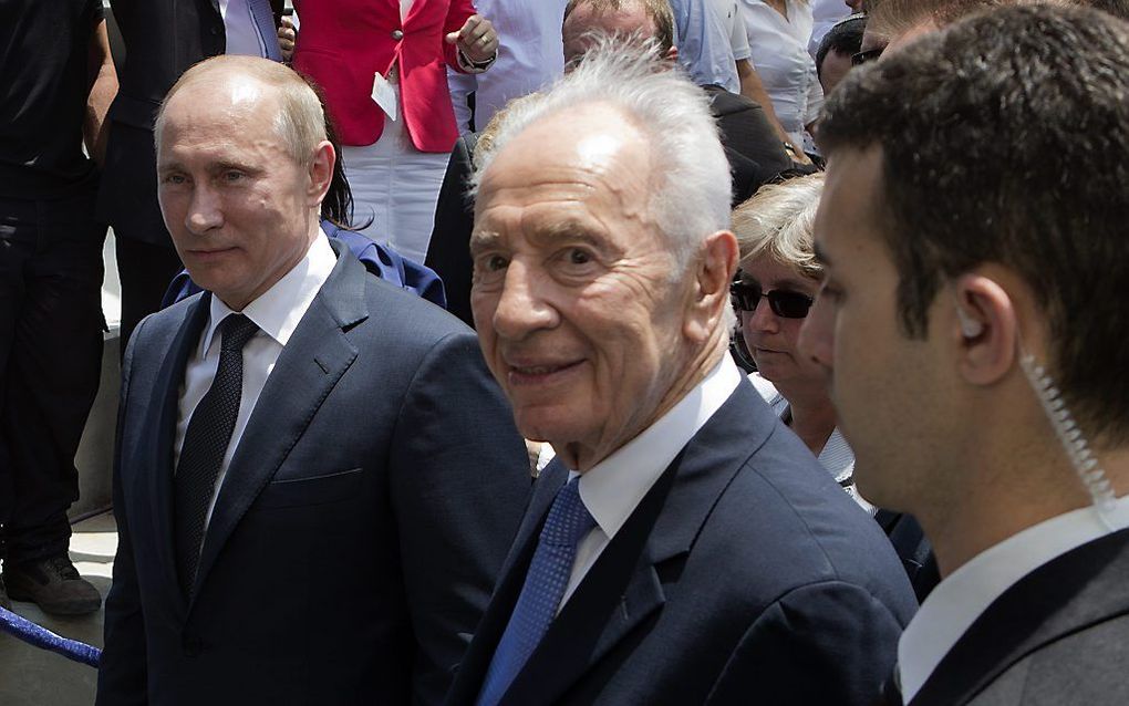 Poetin en Peres.  Foto EPA