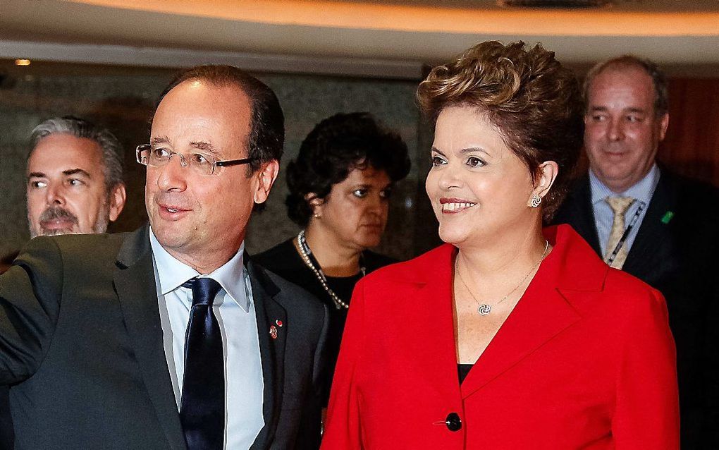 Hollande vorige week met de Braziliaanse president Rousseff op de milieutop in Rio de Janeiro. Foto EPA