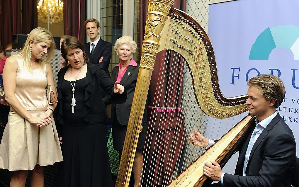 Prinses Máxima bij het optreden van een harpist. Foto ANP