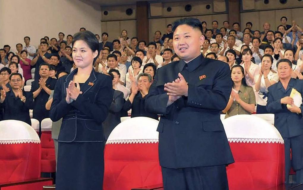 Kim Jong-un met echtgenote. Foto EPA