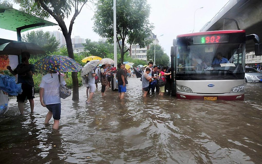 Overstroming in Peking. Foto EPA