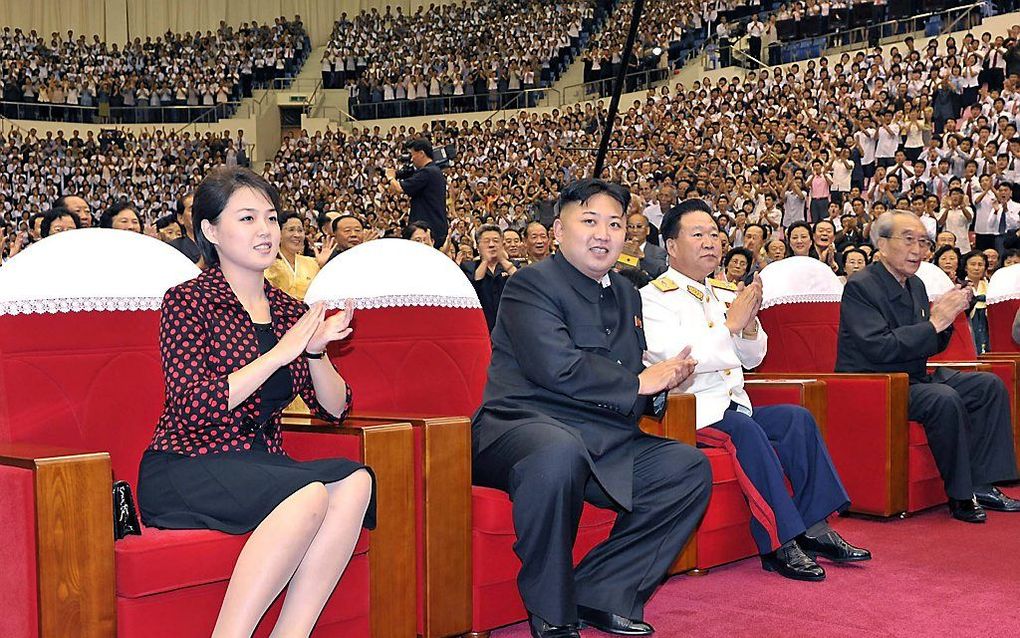 Kim Jong-un en zijn vrouw (links) waren woensdag aanwezig bij een concert in Pyongyang. Foto EPA