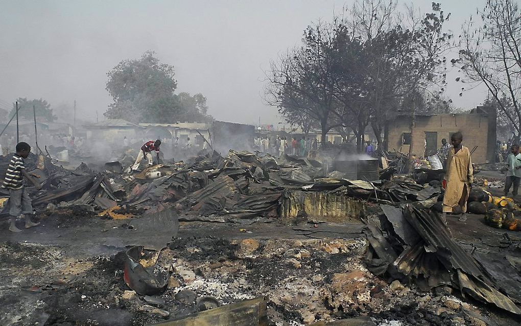 In de Noord-Nigeriaanse stad Maiduguri kwam maandagavond een evangelist om het leven. Hij werd vermoord door Boko Haram. Foto: puinhopen na een aanslag door moslims op een markt in Maiduguri eerder dit jaar. Foto EPA