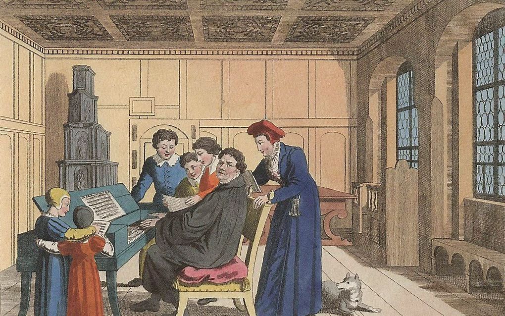 Maarten Luther zingt met zijn gezin. Ets (ca. 1825) van Peter Carl Geissler. beeld Stiftung Luthergedenkstätten in Sachsen-Anhalt