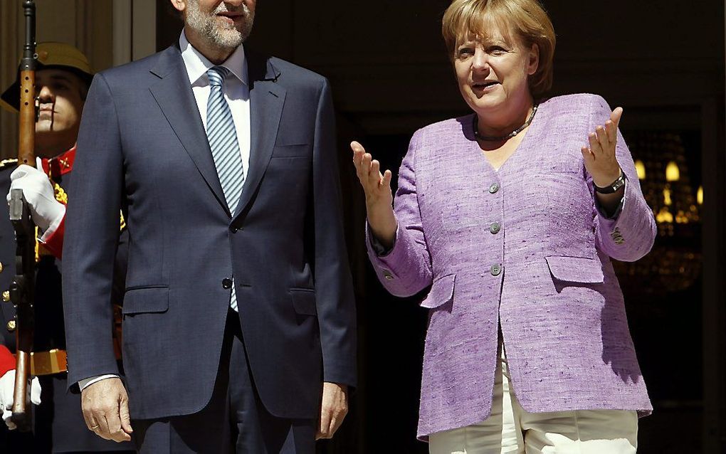 Bondskanselier Merkel en de Spaanse premier Marano Rajoy.  Foto EPA