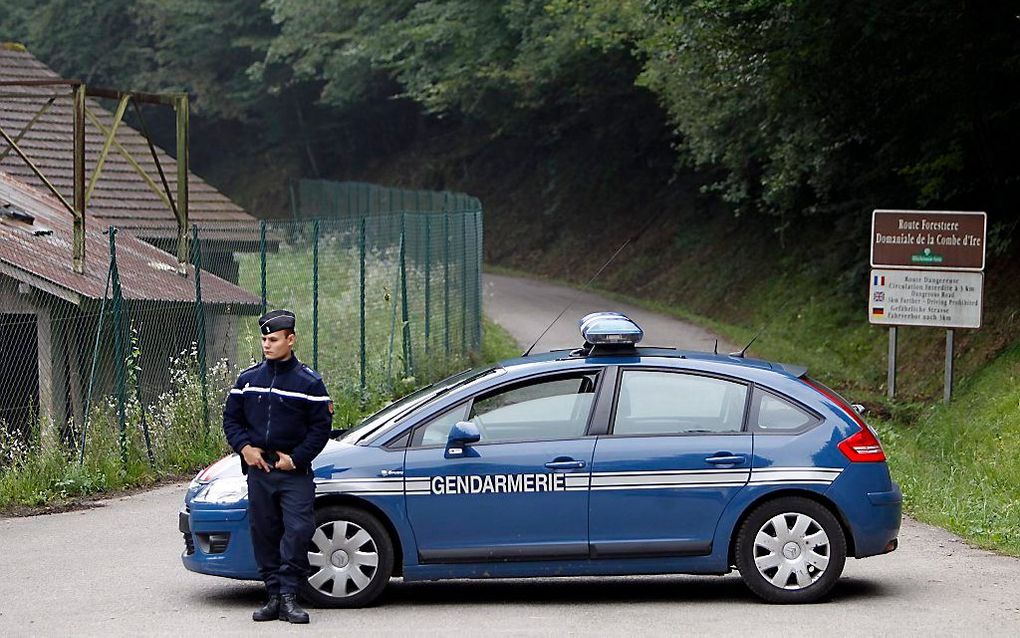 Afzetting bij het meer van Annecy nadat een fietser vier doodgeschoten volwassenen had aangetroffen.  Foto EPA