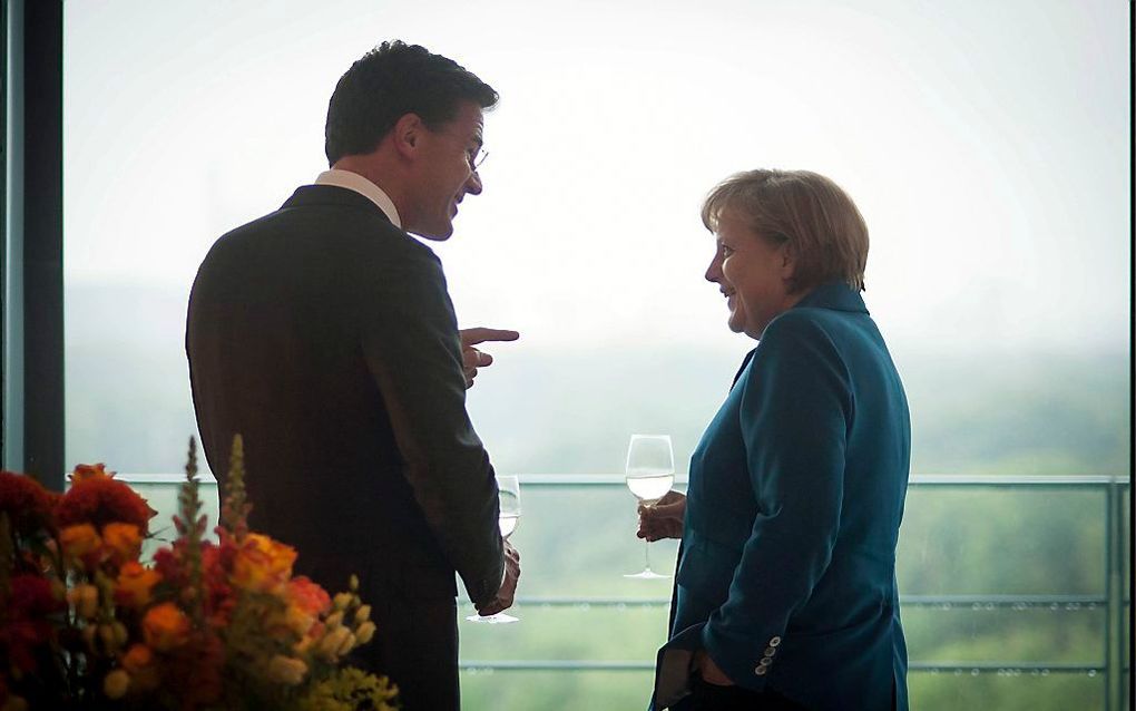 Premier Rutte en de Duitse bondskanselier Merkel in Berlijn, juni 2012. Foto EPA